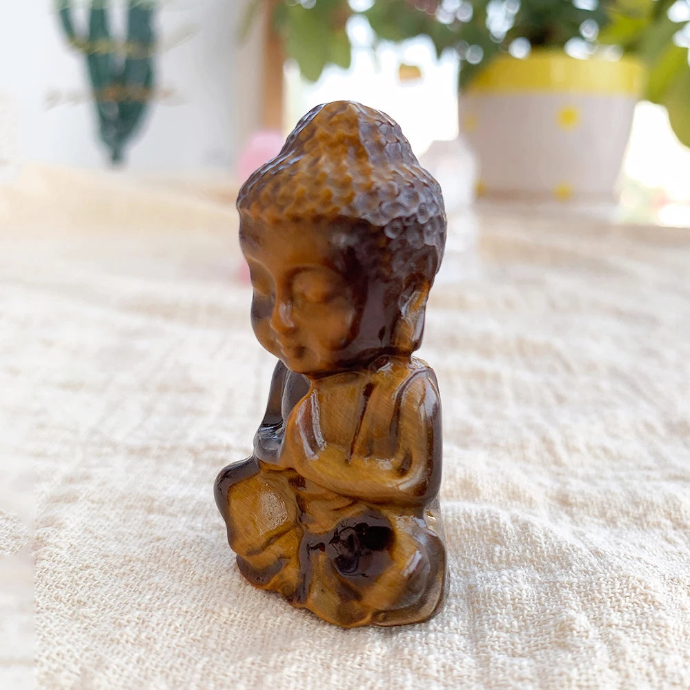 CARVED CRYSTAL BABY BUDDHA FIGURINE