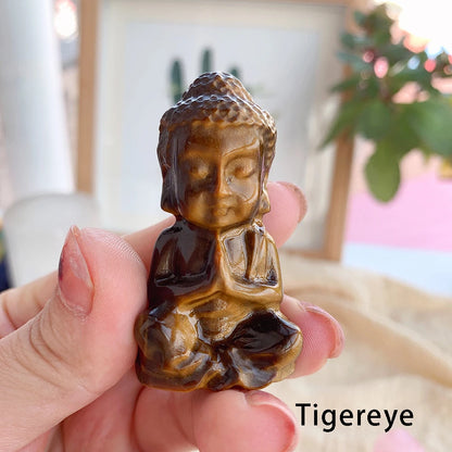 CARVED CRYSTAL BABY BUDDHA FIGURINE