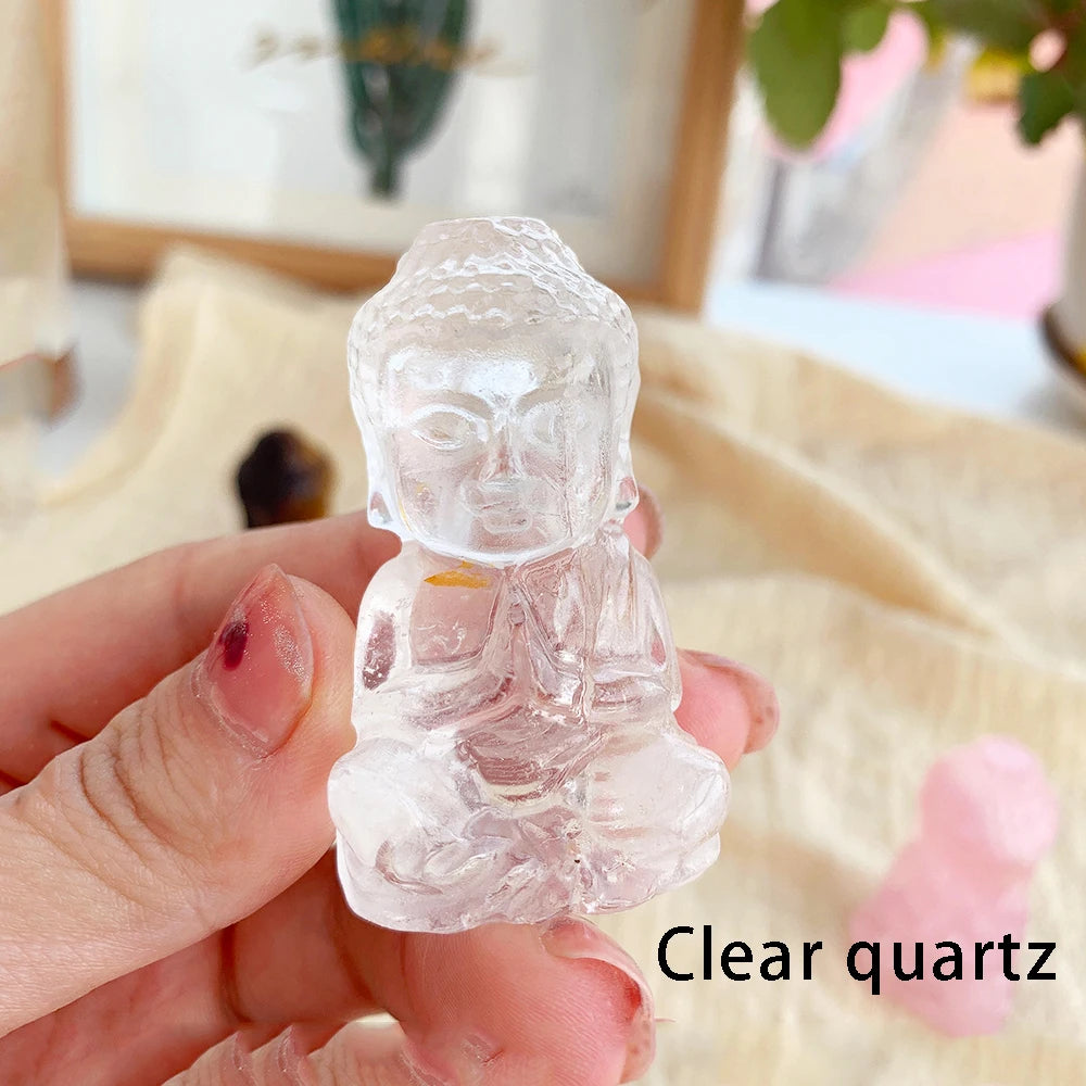 CARVED CRYSTAL BABY BUDDHA FIGURINE