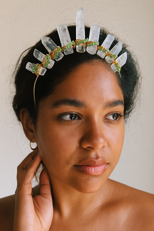 Woman wearing a crystal headband with a neutral background