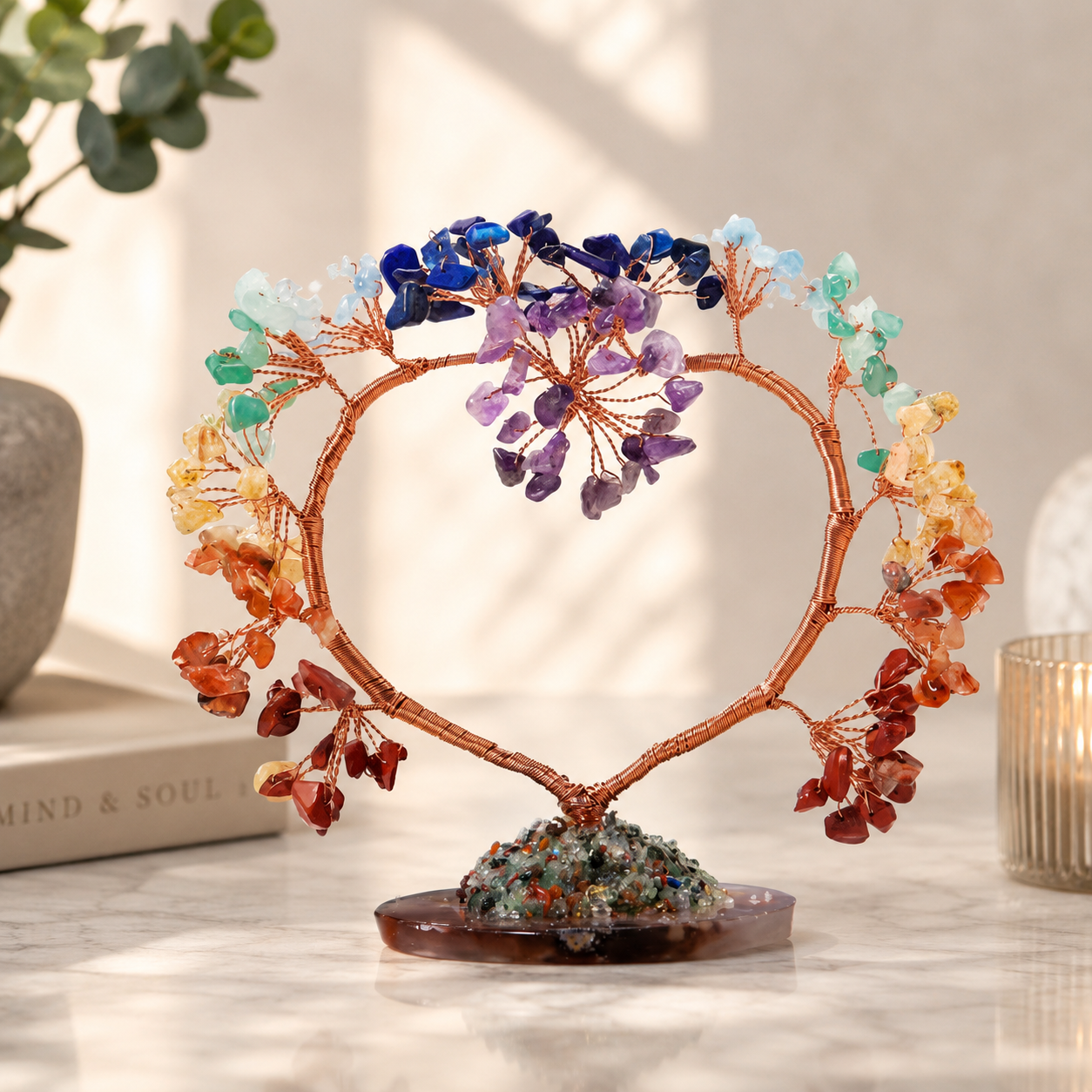Decorative heart-shaped crystal tree on a table with a soft background