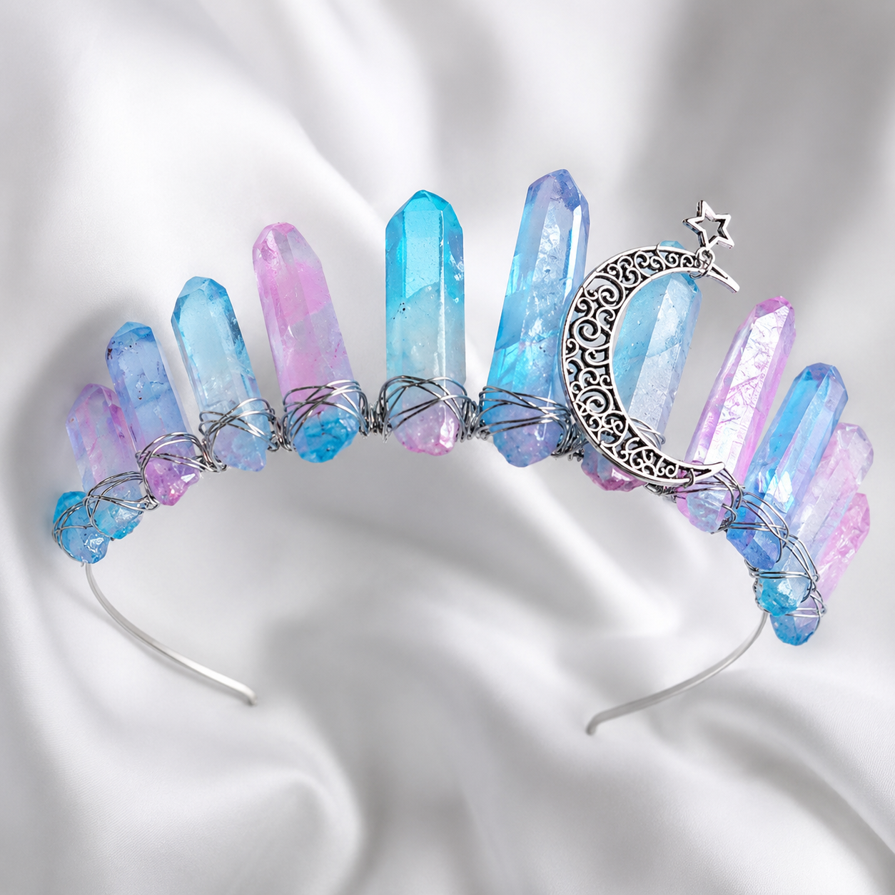 Crystal headband with blue and pink stones on a white background