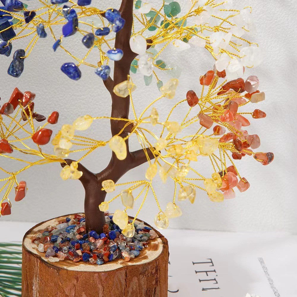 Decorative tree with colorful stones on a white background