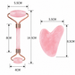 Measurement chart of a pink facial roller and gua sha tool on a white background