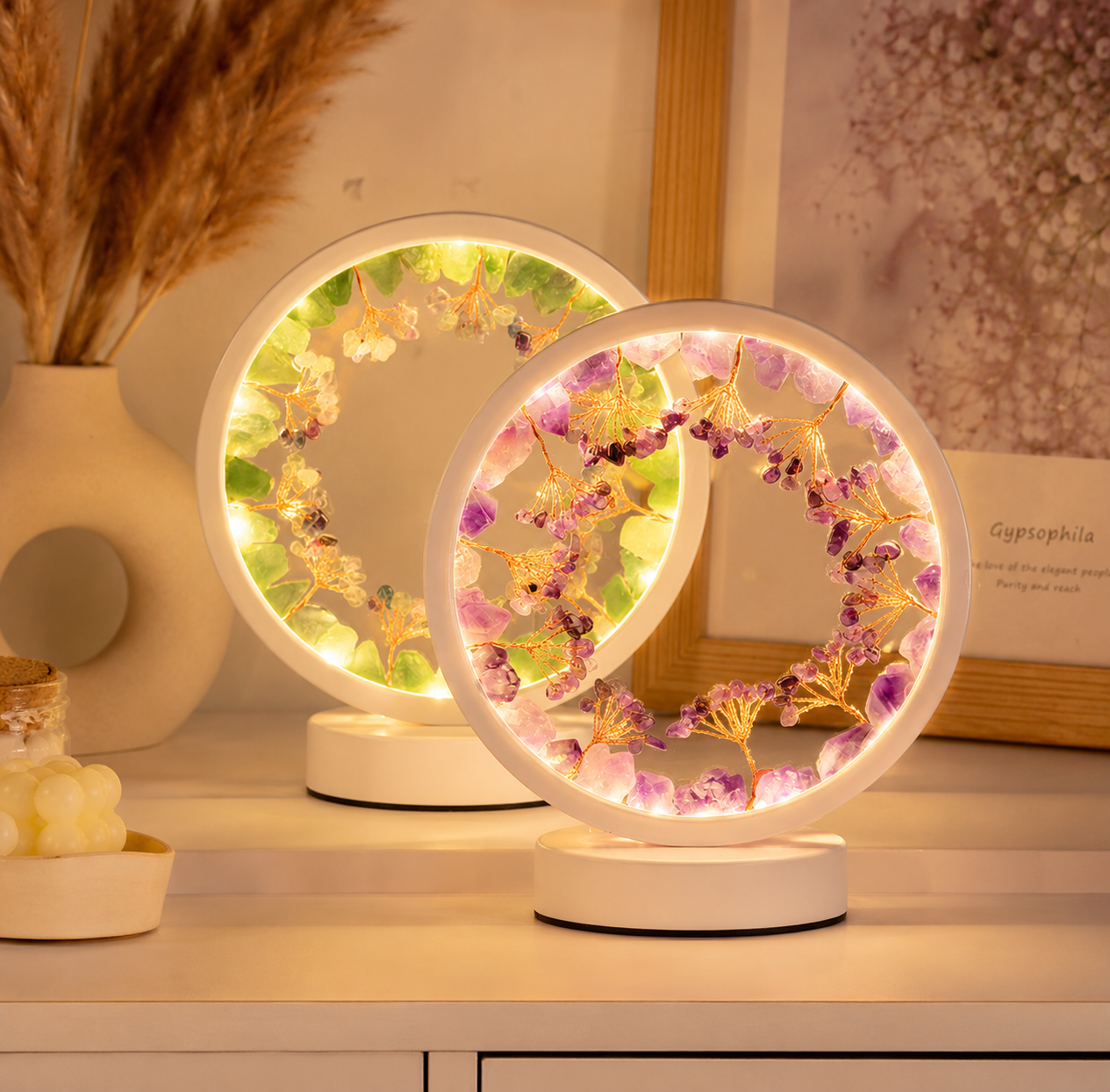 Decorative table lamps with floral designs on a wooden surface.