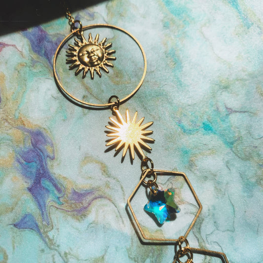 GOLD SUN & STAR SUNCATCHER WITH RAINBOW GLASS REFLECTION